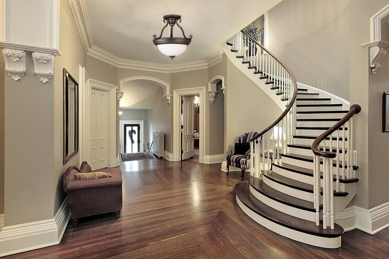 Rubbed bronze semi flush ceiling lights by staircase