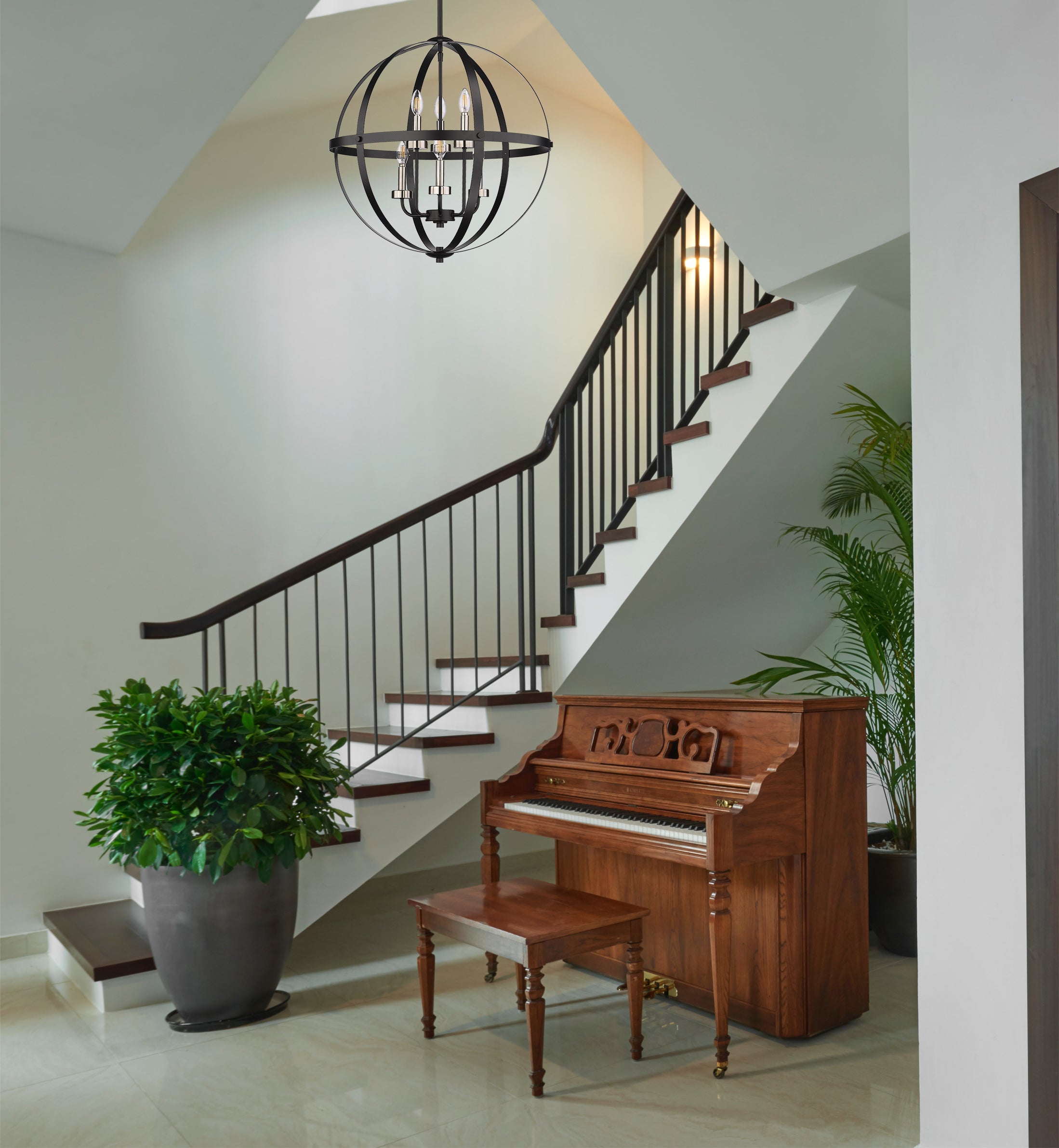 Modern black globe chandelier staircase